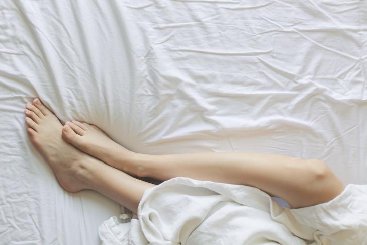 pexels photo 545015 legs bed